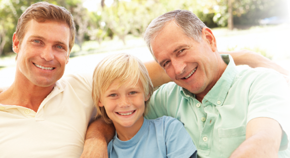 istock photo of three male generations grandfather father and young son